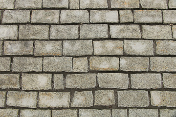 Fototapeta premium A street lined with stones and cobblestones