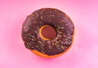 Donut on a bright background.