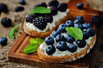 Blueberry and blackberry ricotta rye sandwiches