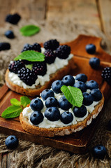 Blueberry and blackberry ricotta rye sandwiches
