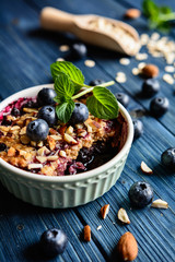 Blueberry crumble with oat flakes and almonds