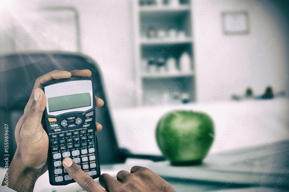 Poster composite image of hands of businessman using calculator