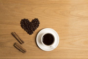 Coffee with coffee beans and cinnamon 