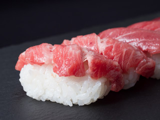 sushi set on black plate