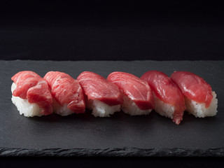 sushi set on black plate