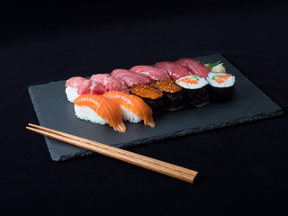 sushi set on black plate