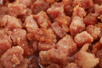 Surface covered with bacon bits