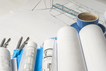 Workplace of architect - rolls and plans.