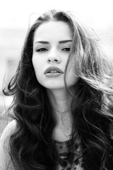Naklejka premium outdoor fashion portrait of young beautiful woman with long dair hair 