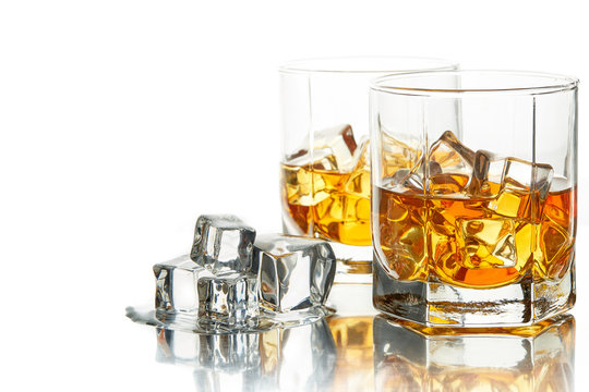 Whiskey glasses with ice.