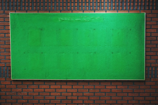 Green Board In The Brick Wall