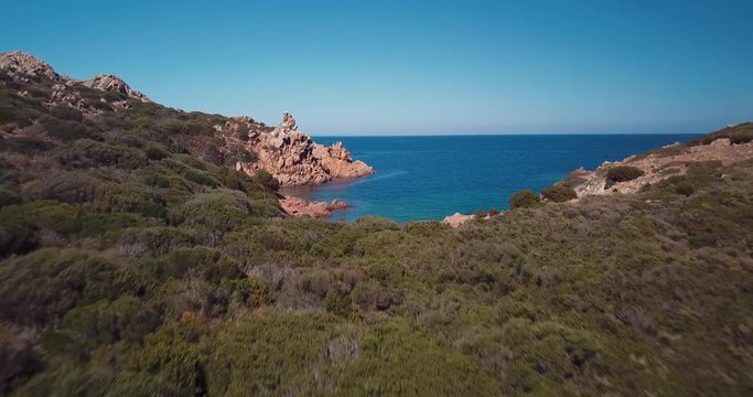 Aerial video of a paradisiac beach on the island of Mortorio in Sardinia, incredible island of the Emerald Coast in Italy...