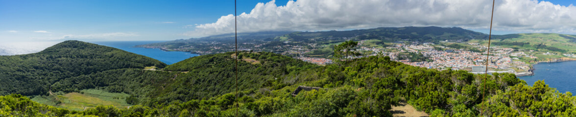 Fototapeta na wymiar Angra do heroismo wide panorama from Monte Brazil viewpoint, Terceira, Azores, Portugal