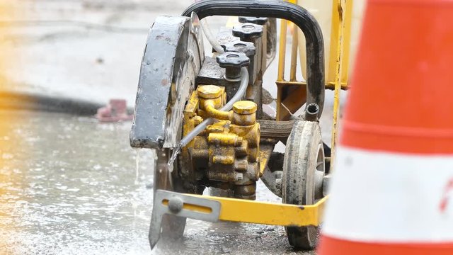 Road construction with an asphalt cutter
