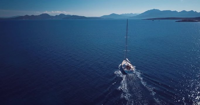 Aerial video of a sailing boat in Sardinia, incredible island of Italy..