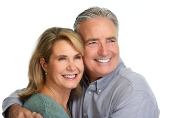 Senior couple smiling.