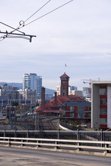 Cityscape downtown train station surrounded by high rise modern buildings Portland Oregon