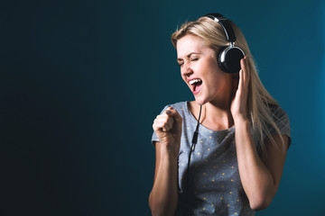 Happy young woman with headphones