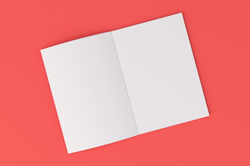 Blank white open brochure mock-up on red background
