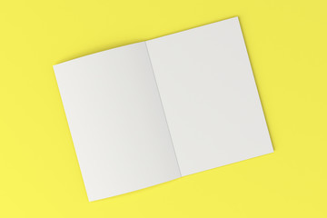Blank white open brochure mock-up on yellow background