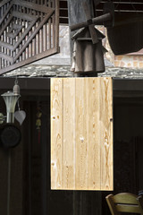 Signboard Wood vintage hanging on the wooden pole.