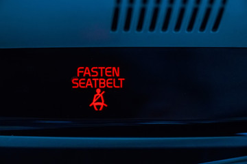 Fasten seat belt sign in car