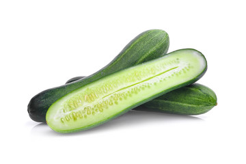 fresh cucumber with half slice isolated on white background