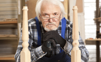 Portrait carpenter in furniture factory