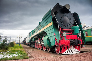 Old steam locomotives on the station platform