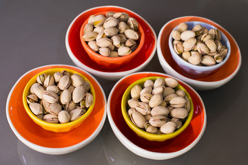 Pistachio nuts in attractive porcelain bowls