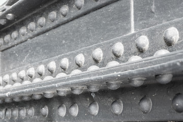 Close up riveted steel of the bridge