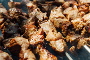The pork shish kebabs prepared on a brazier