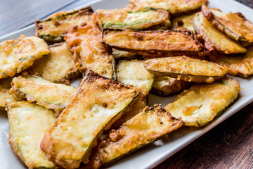 Homemade Fried Zucchini Fries on plate.