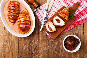 Delicious chicken rolls with dried tomatoes and mozzarella.