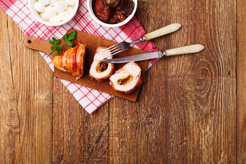 Delicious chicken rolls with dried tomatoes and mozzarella.