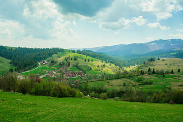 Fototapeta na wymiar Landscape of great mountains in spring in the sunny day