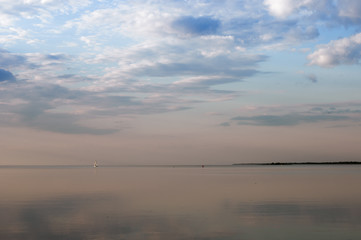 Lonely yacht on the river horizon