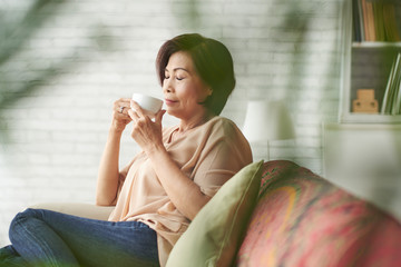 Enjoying smell of coffee