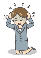 頭を抱える女性