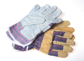 Two Pair of protective work gloves isolated on a white background.