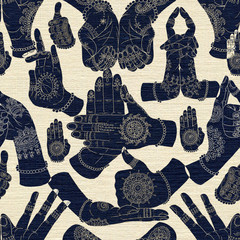 Seamless background with hand mudras on textured background
