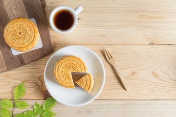 Mooncake and tea cup. Top view.