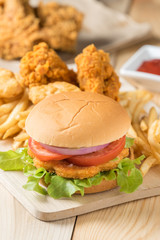 Fast food hamburger with set fried chicken and french fries.