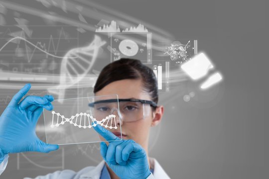 Woman doctor watching DNA graphics - Powered by Adobe