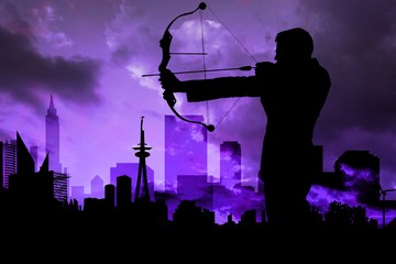 Shadow of archery player in front of purple sky background