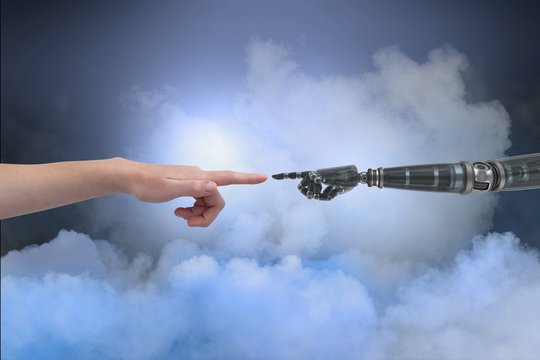 Human and robot touching their fingers in cloudy background