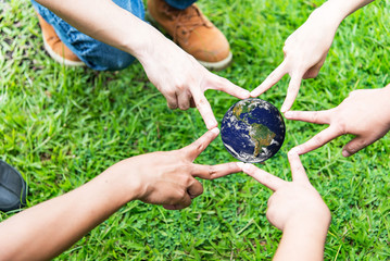 Concept of teamwork Business people join hands, . Elements of this image furnished by NASA