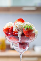  Strawberries and cream in glass bowl