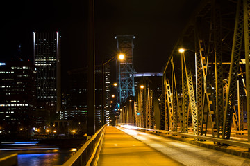 Bascule bridge across the river in the night lighting