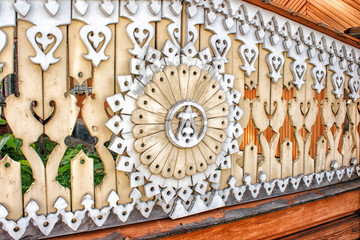 wooden fence decorated with carvings